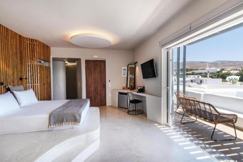 TV a/nebo společenská místnost v ubytování Onar Hotel & Suites