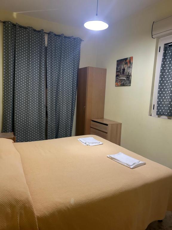 Postel nebo postele na pokoji v ubytování Albergo pensione Bianco