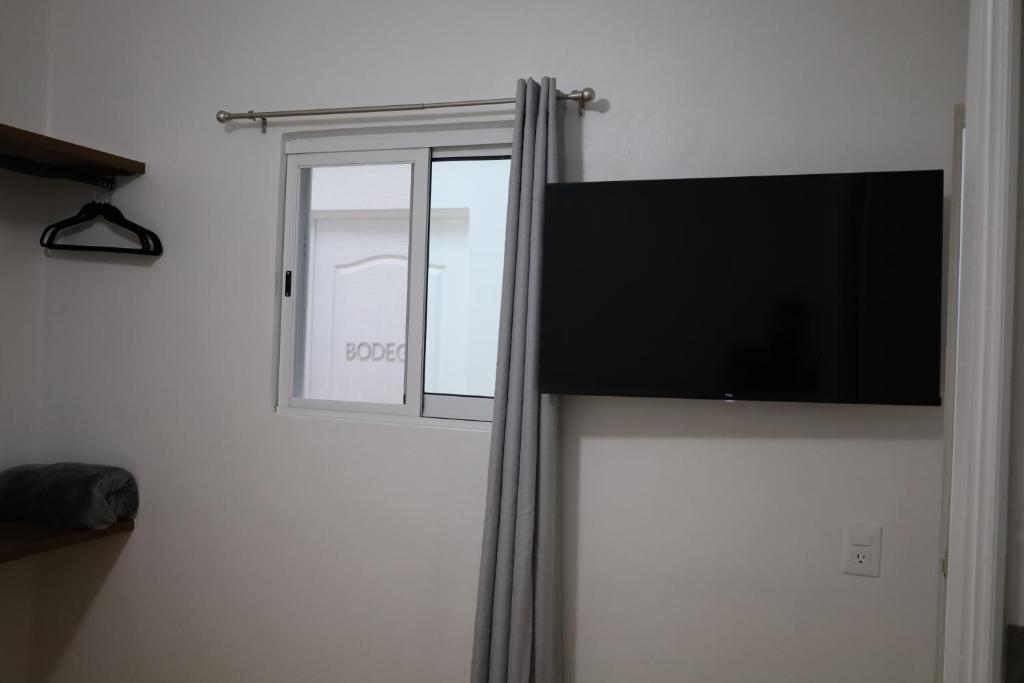 TV a/nebo společenská místnost v ubytování Hotel Mado