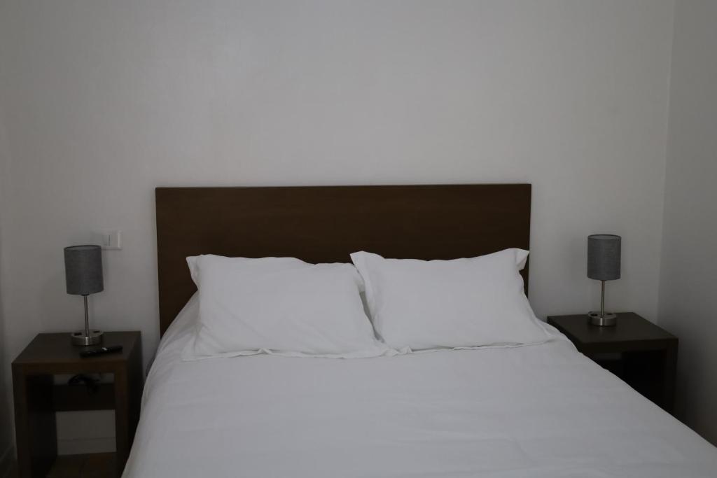 Postel nebo postele na pokoji v ubytování Hotel Mado