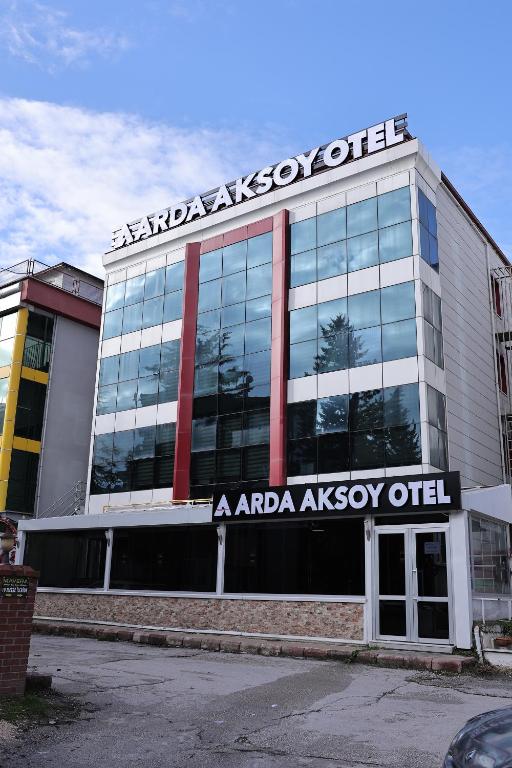 a building with a sign on the front of it at ARDA AKSOY OTEL 