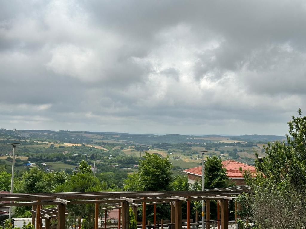 a view of the countryside from the roof of a house at Pilot hotel in Arnavutköy