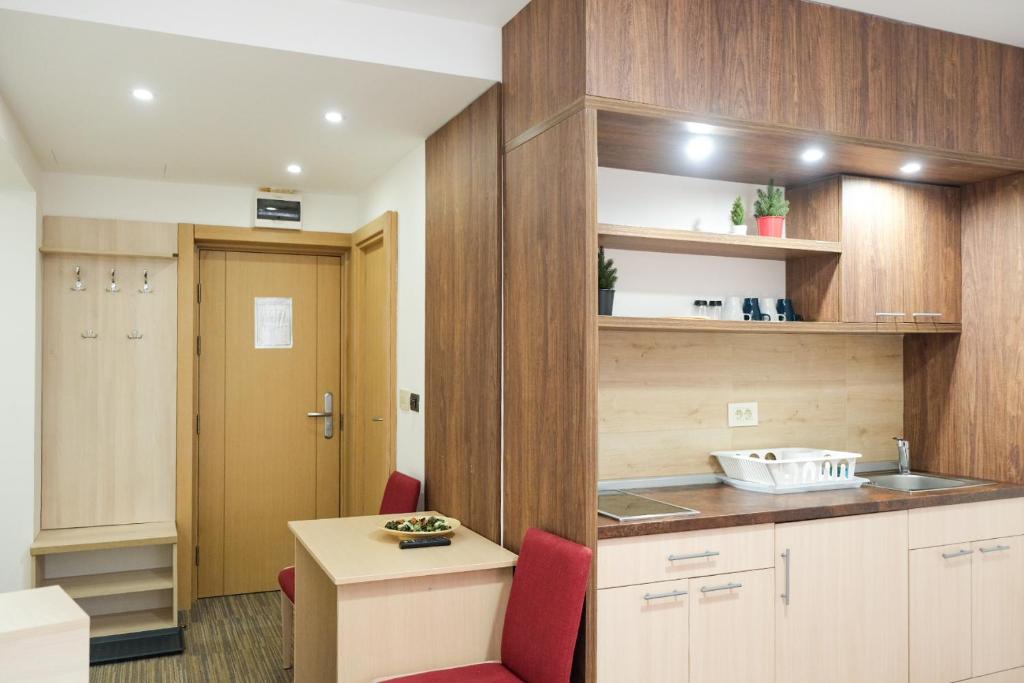 Kuchyň nebo kuchyňský kout v ubytování Apartments Pavle