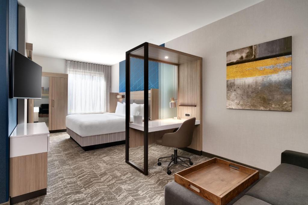 Postel nebo postele na pokoji v ubytování SpringHill Suites by Marriott Phoenix Scottsdale