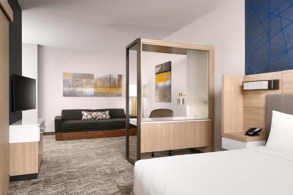 Postel nebo postele na pokoji v ubytování SpringHill Suites by Marriott Phoenix Scottsdale