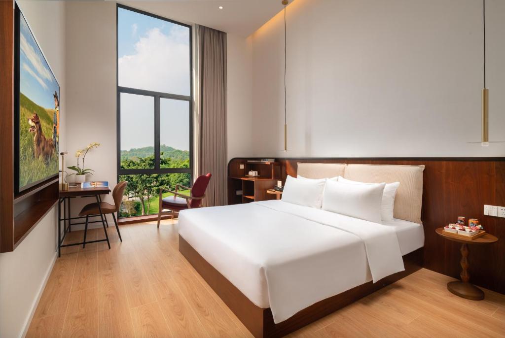 Katil atau katil-katil dalam bilik di Wuyu Hotel, Smart Park & Happy Valley Jinshansi Metro