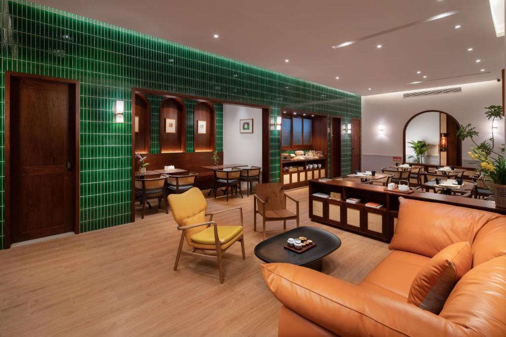 Ruang duduk di Wuyu Hotel, Smart Park & Happy Valley Jinshansi Metro