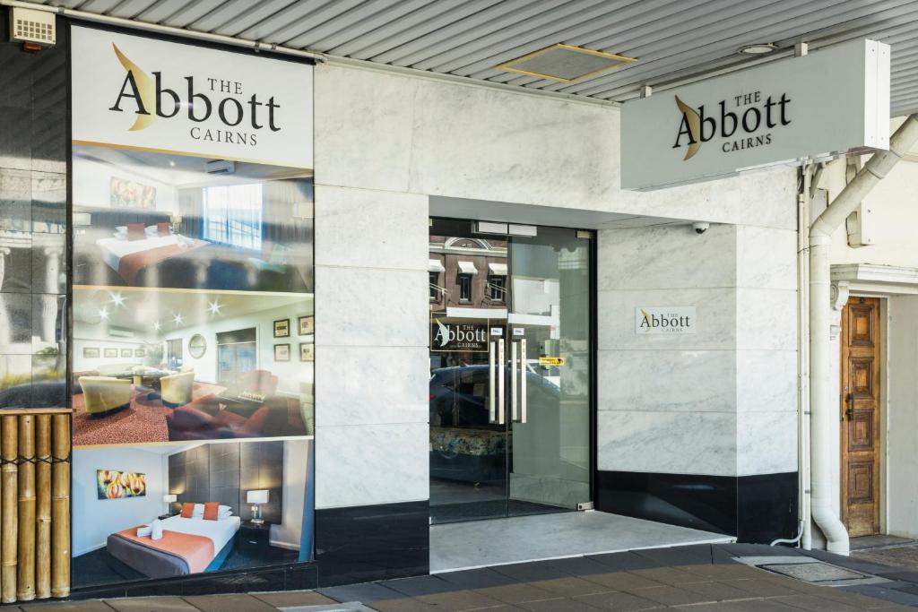 a store front with a sign for the abbott clinic at The Abbott Boutique Hotel in Cairns