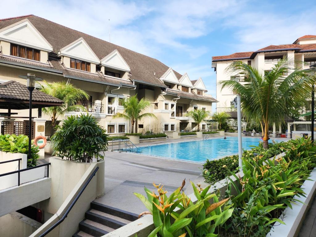 a view of a resort with a swimming pool at Domitys Bangsar Kuala Lumpur in Kuala Lumpur
