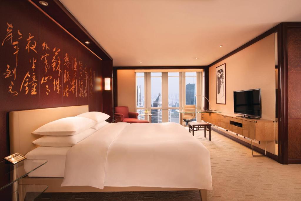 TV a/nebo společenská místnost v ubytování Grand Hyatt Shanghai