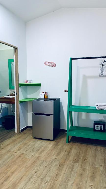 Postel nebo postele na pokoji v ubytování Be Happy Hotel