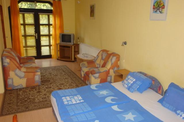 Cama o camas de una habitación en Aranyoroszlán Vendégház