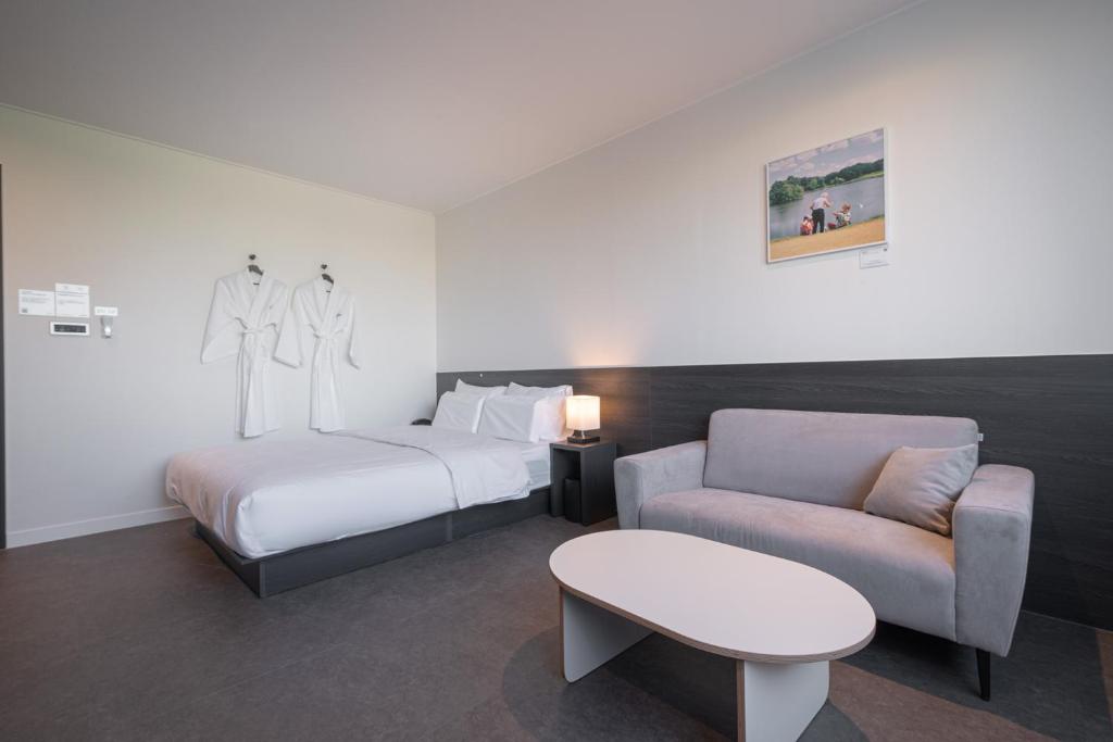Postel nebo postele na pokoji v ubytování Workers Hotel Daejeon by Aank