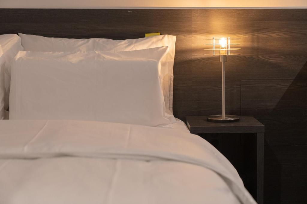 Postel nebo postele na pokoji v ubytování Workers Hotel Daejeon by Aank