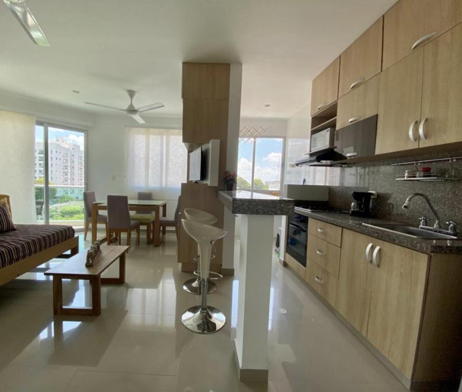 Kjøkken eller kjøkkenkrok på Hermoso Apartamento con Piscina 1 Habitacion AT55