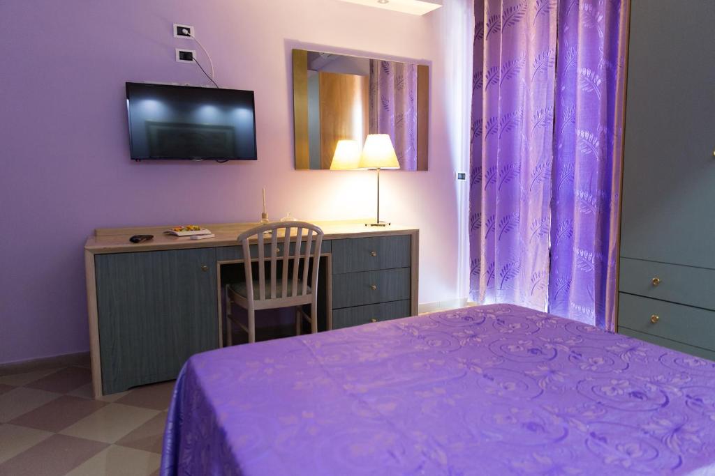 Maximo Hotel - Habitación Cuádruple