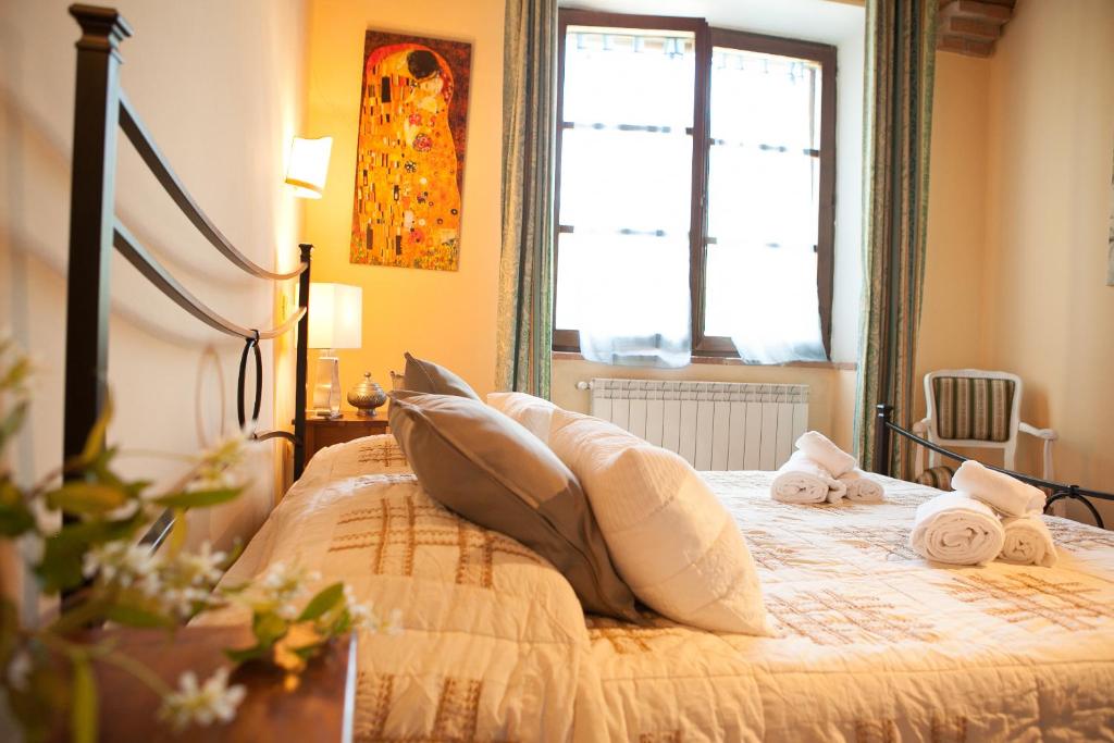 Letto o letti in una camera di Il Vecchio Mulino Toscana