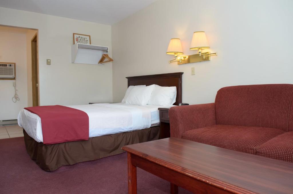 Postel nebo postele na pokoji v ubytování Kings Motor Inn