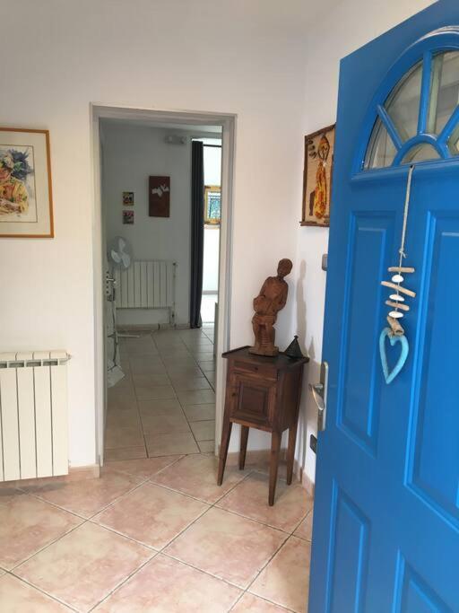 a blue door leading to a hallway with a room at FLC-Sea View-Jacuzzi-3 Bedrooms-8p-Parking for 2 cars in Marseille