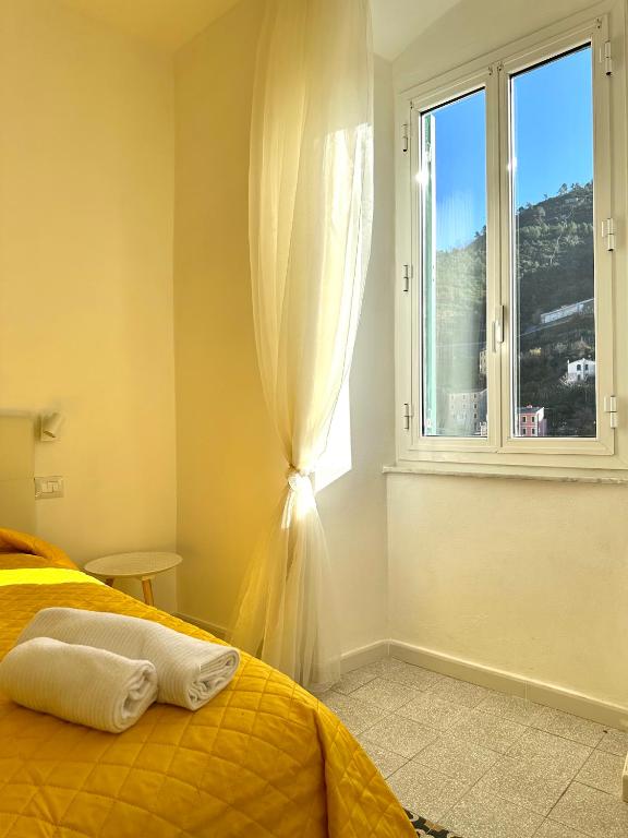 Postel nebo postele na pokoji v ubytování Al Castello 1