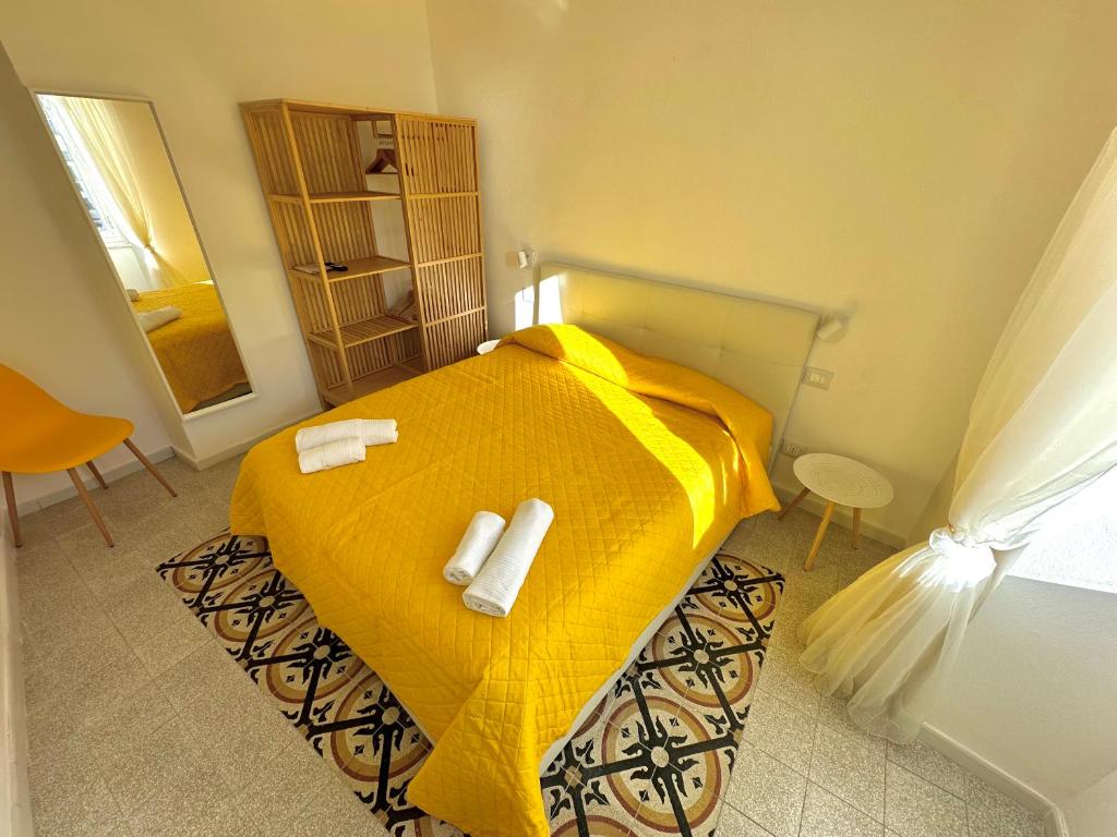 Postel nebo postele na pokoji v ubytování Al Castello 1