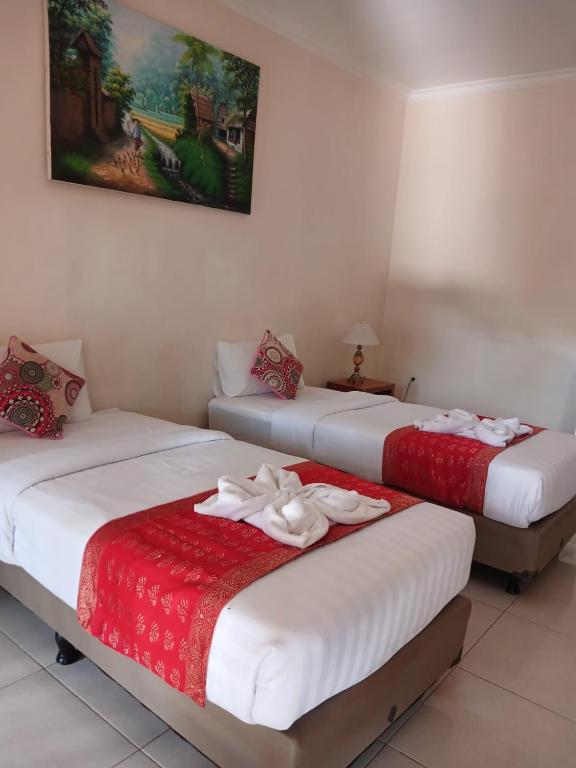 Postel nebo postele na pokoji v ubytování Semaya Homestay
