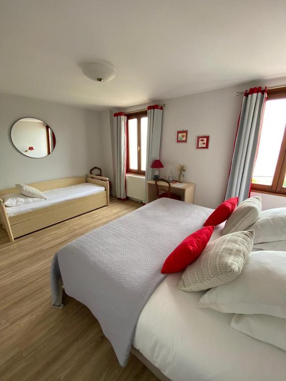 Postel nebo postele na pokoji v ubytování Hôtel de la Plage