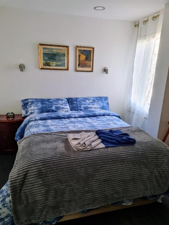 Postel nebo postele na pokoji v ubytování Apartament Melpomeny