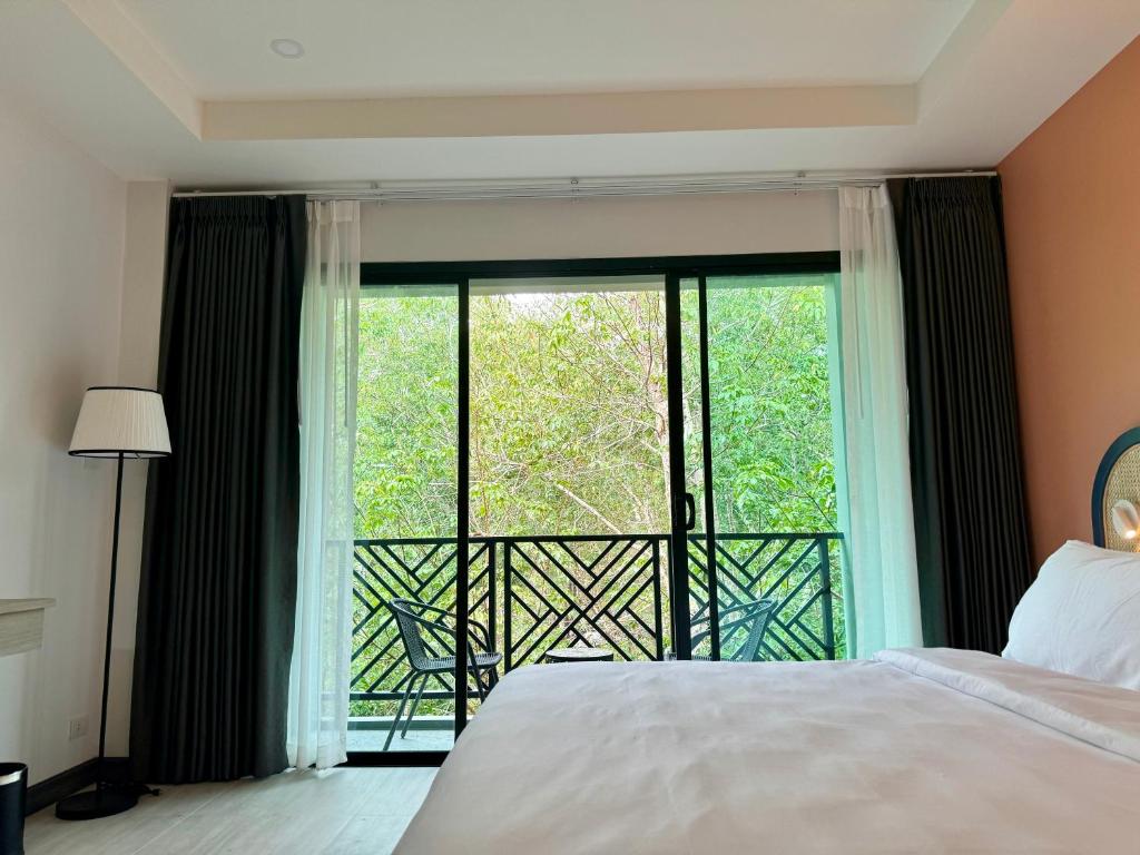 Postel nebo postele na pokoji v ubytování Keereen Resort - Ao Nang Krabi