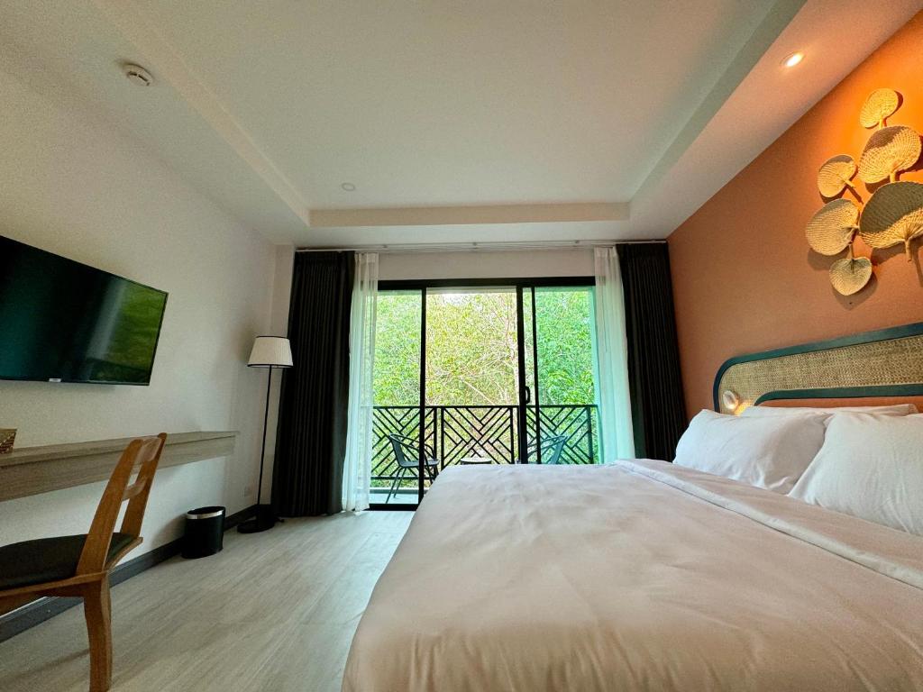 Postel nebo postele na pokoji v ubytování Keereen Resort - Ao Nang Krabi
