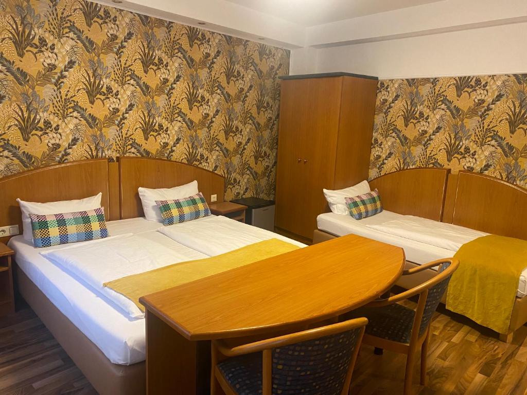 Postel nebo postele na pokoji v ubytování Hotel Condor