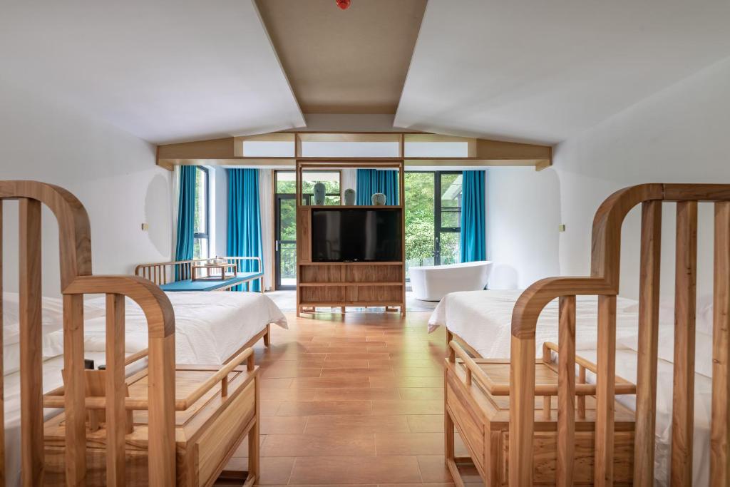 Zhangjiajie Qiquan Vacation B&B - Habitación Gemela Con Balcón