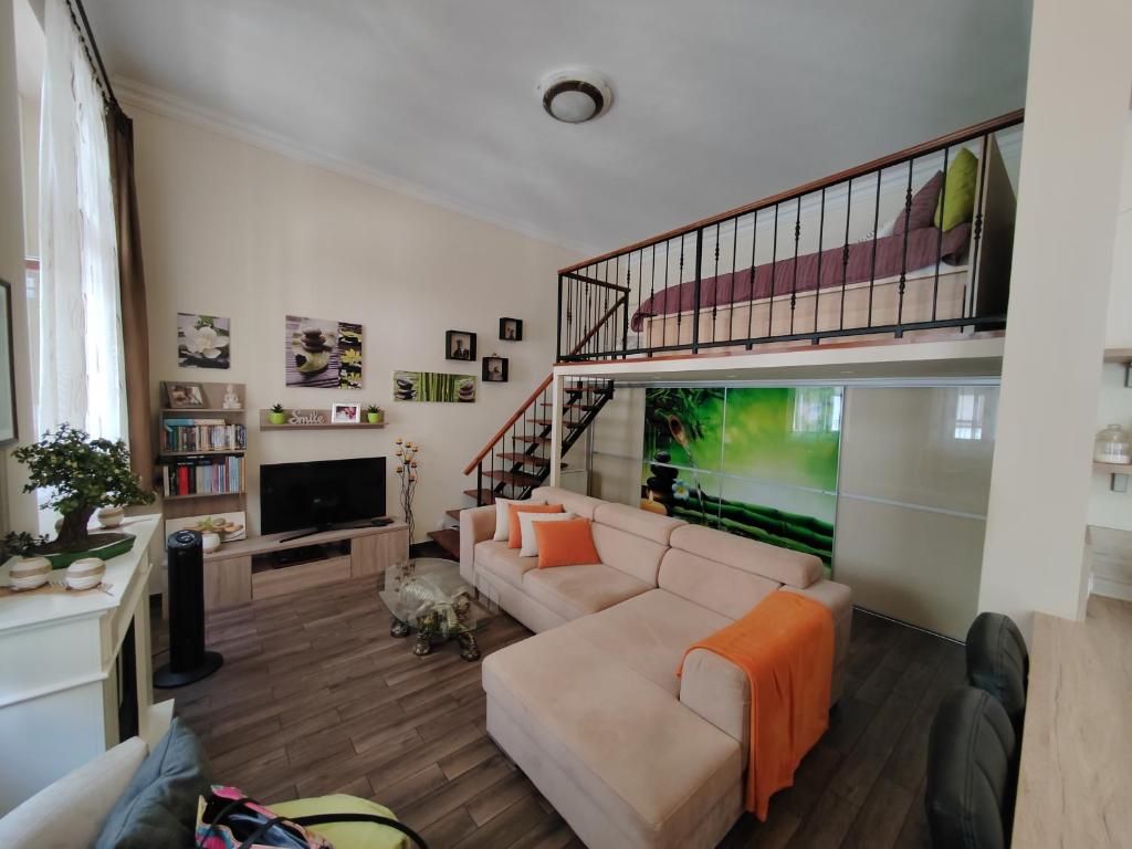 Et tv og/eller underholdning på Hermes Apartament