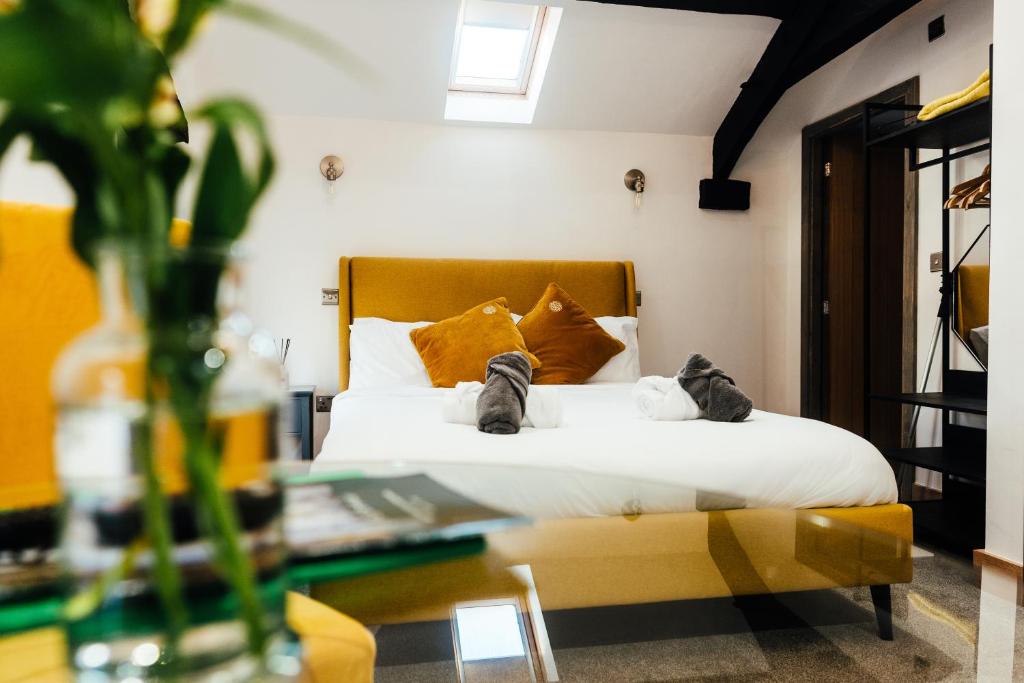 מיטה או מיטות בחדר ב-Rigney Bank House, South Lakes Luxury Apartments