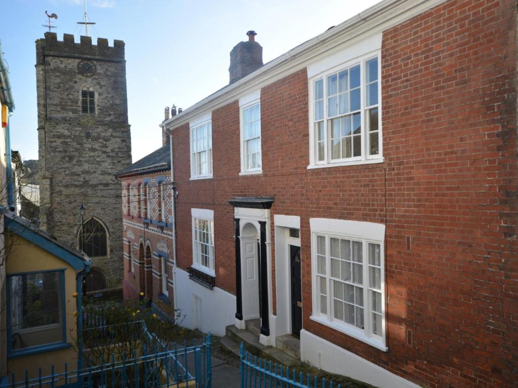 a brick building with a clock tower on top of it at 2 Bed in Bideford 37262 in Bideford