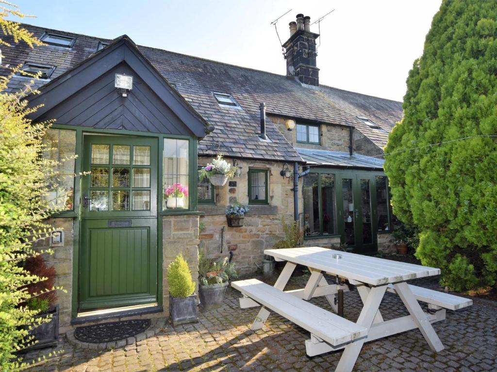 a house with a picnic table in front of it at 3 Bed in Whitley Bay CN011 in Backworth