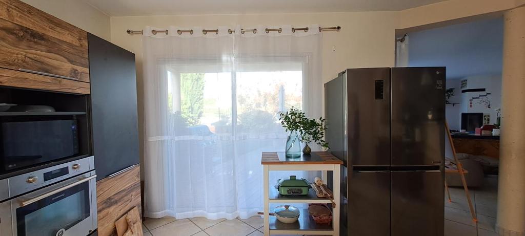 Kuchyň nebo kuchyňský kout v ubytování Villa des Climats Bourgogne