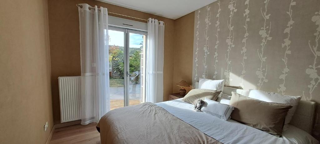 Postel nebo postele na pokoji v ubytování Villa des Climats Bourgogne