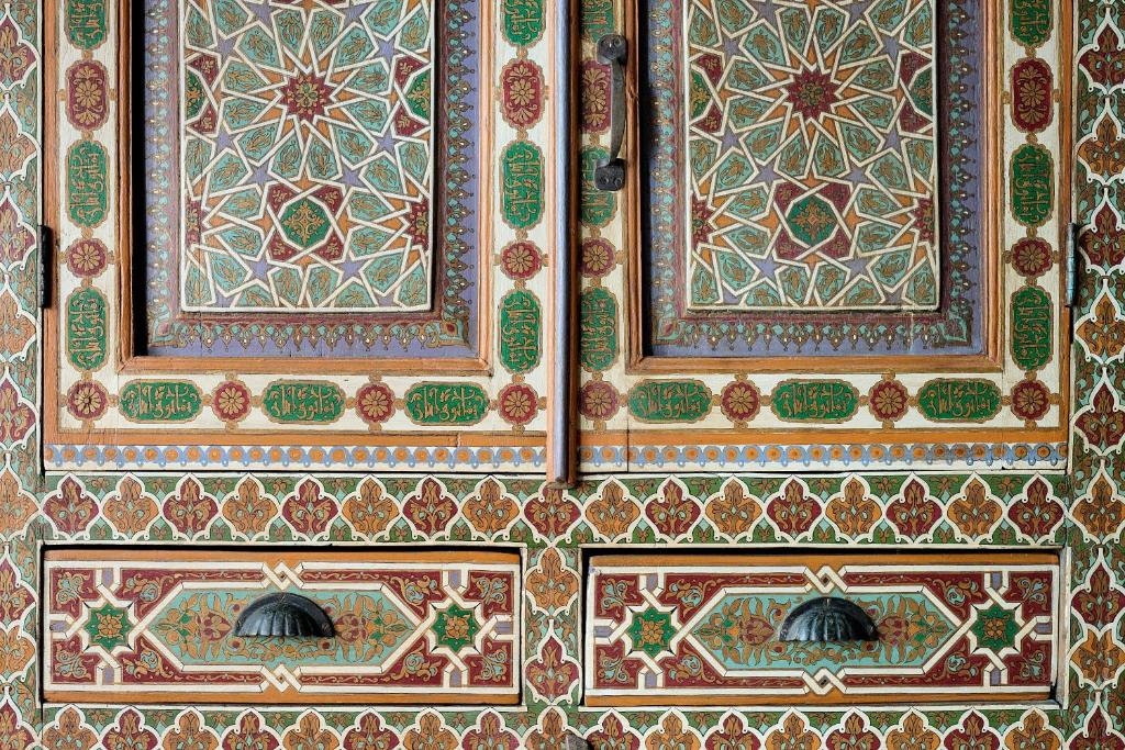 a wall with patterns and designs on it at Iberostar Waves Saidia in Saidia 