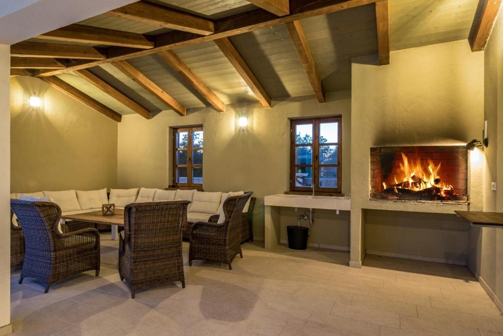 Posezení v ubytování Villa Rajana for 14 persons with kids playground & pool heating in Central Istria