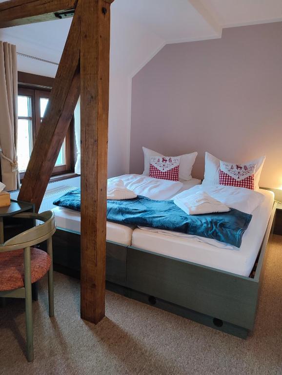 Postel nebo postele na pokoji v ubytování Auersberg Haus