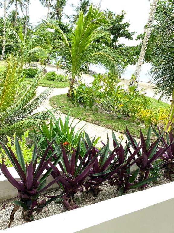 Private Beachfront Villa in Siargao - Queen Room With Shared Bathroom