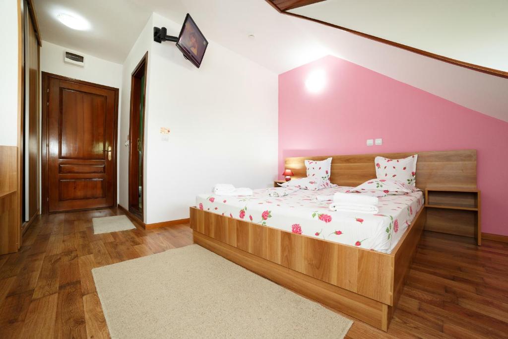 Postel nebo postele na pokoji v ubytování Hotel Insula