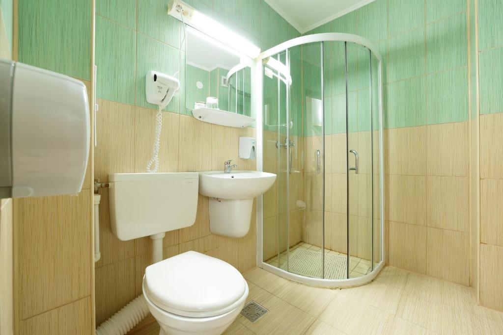 Koupelna v ubytování Hotel Insula