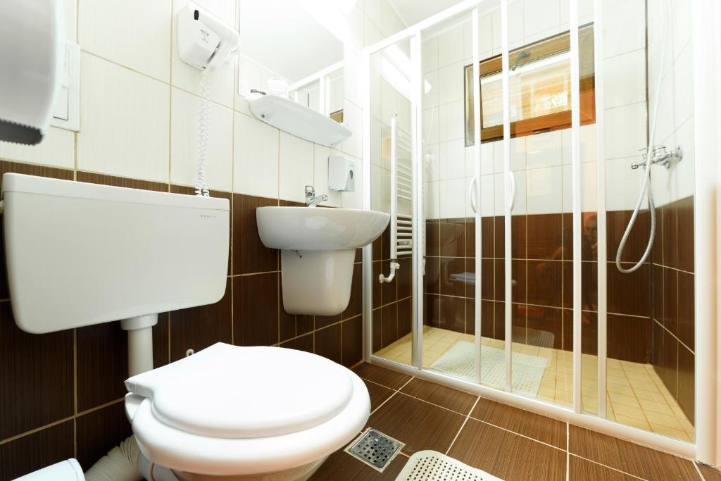 Koupelna v ubytování Hotel Insula