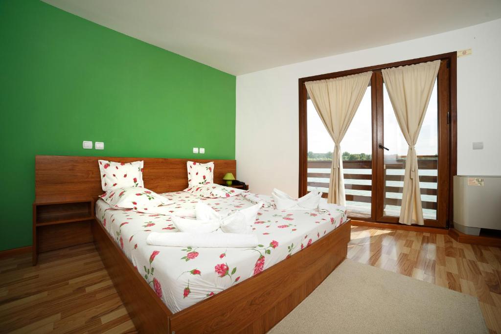 Postel nebo postele na pokoji v ubytování Hotel Insula