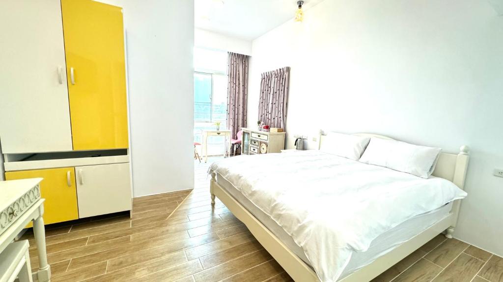 Postel nebo postele na pokoji v ubytování 兆億申襄采民宿1741 Zhao Yì Shen Xiang Cai Homestay 1741