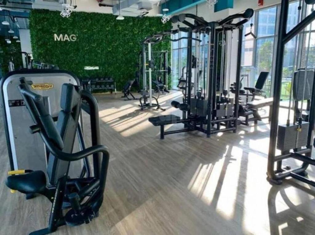 Fitness centrum a/nebo fitness zařízení v ubytování Classic 1BR at MAG 510 Dubai South by Deluxe Holiday Homes