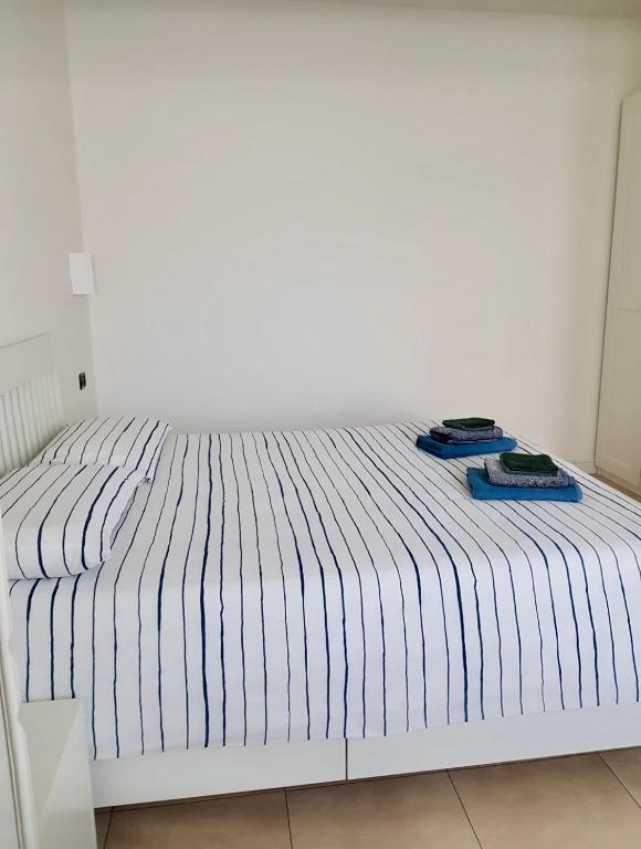 Postel nebo postele na pokoji v ubytování Canottieri home