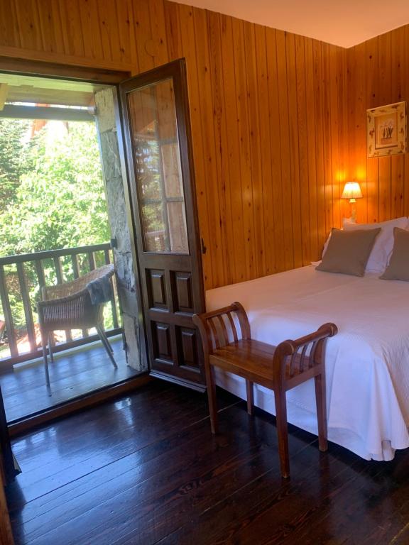 Posteľ alebo postele v izbe v ubytovaní El Xalet de Taüll Hotel Rural
